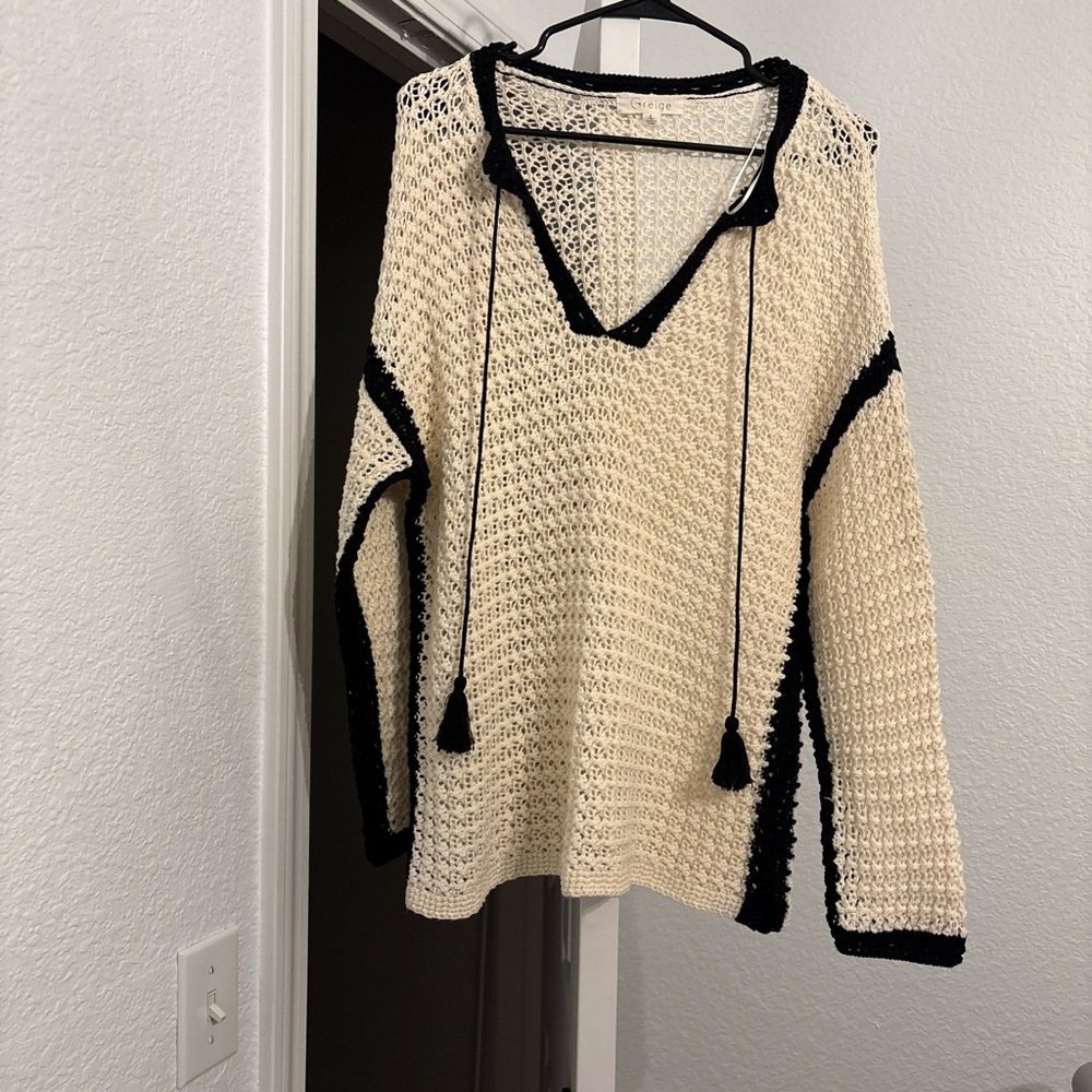 Elegant V-Neck Sweater with Black Trim